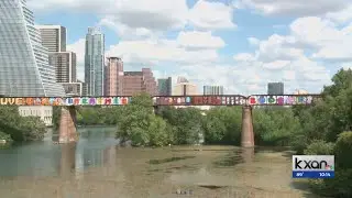What is growing in Lady Bird Lake?