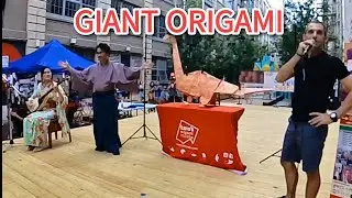 GIANT ORIGAMI folding on the stage at Japan Village Summer Festival 2023