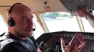 John Travolta Flying His Plane!