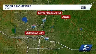 Crews extinguish fire at mobile home near Jones