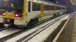 Southeastern Networker Train sparking in the snow