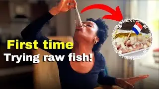An African try Herring (Dutch raw fish) for the first time!🤷🏽&zwj;♀️🇳🇱
