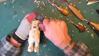 Carving the caricature figure with hand tools 15