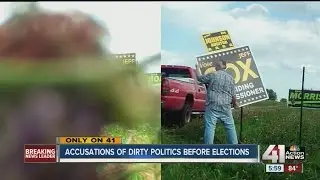 People taking down campaign signs along Highway 71