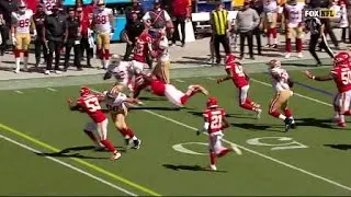 Matt Breida runs past an arm tackle for 21 yards