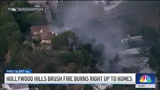 Brush fire burns near Hollywood Hills homes