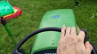 1964 John Deere 110 round fender mowing