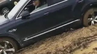 Girl driving a Bentley bentayga got it stuck!!