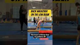 Back walkover on the low beam. Where confidence meets balance &mdash; one step, one flip at a time.