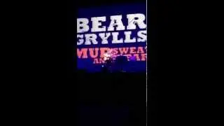 Bear Grylls Sings Live on Stage with Acoustic Guitar