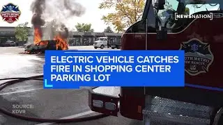 Electric vehicle catches fire in shopping center parking lot