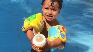 Baby Alp drank juice from her bottle, bottle fell into the pool