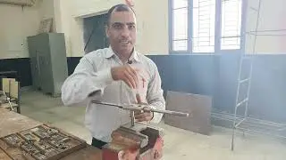 Holding the job in bench vice and tapping by Hand (tap size 5/8