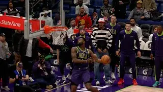 Slo-mo angles of massive Zion Williamson 360&deg; windmill dunk!