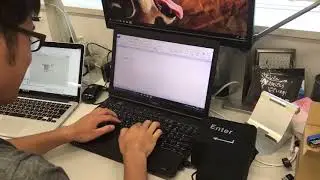 Man has fun hitting giant Enter key while typing
