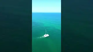 Drone Captures Amazing Footage of a Boat Sailing in the Blue Sea