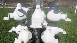 Installing a speaker system to play the dawn song to attract Purple Martins to nest in our gourds.