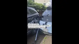 Caught on video: Human-driven Waymo loses control, slams into parked cars in LA