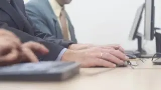 Men Working On Computers Stock Video