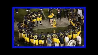 Breaking News | Michigan players lock arms during national anthem to protest social injustice