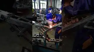 Video of a motorbike assembly line in an industrial factory setting #automatedassembly