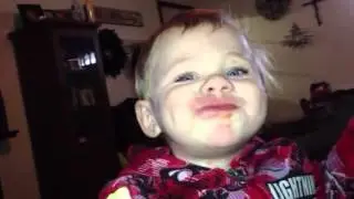 Abel eating an apple
