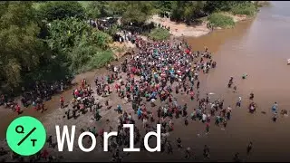 Hundreds of Central American Migrants Cross Suchiate River into Mexico