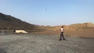 Clay dove with pistol shot