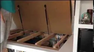 Save space with a fold up bed - using gas struts