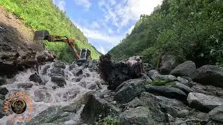 Schreitbagger   Menzi Muck Challenge mit fluss