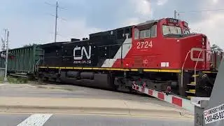 Northbound Canadian National #2332 pulling empty centerbeams - West Chicago, IL