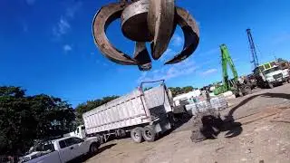 real scrap yard work; unloading and countng metal