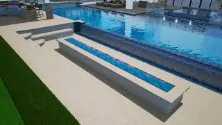 Luxury Pool Design with a Unique Infinity Edge Flowing into a Sunken Firepit ✨🔥💦