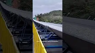 🛣️ That's a Long-Distance Conveyor Belt Gallery!You might spot these massive, enclosed structures sn