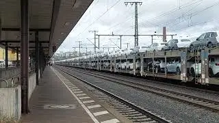 Zugdurchfahrt zweier G&uuml;terz&uuml;ge, beide von je einer Werbevectron gezogen am Bahnhof Fulda