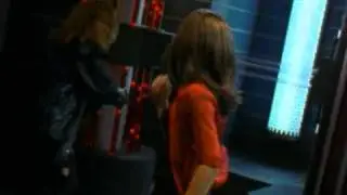 Black Scorpion / Det. Darcy Walker (Michelle Lintel) fights against a pyromaniac