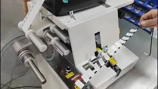 Cable flag labeling machine with online barcode printer
