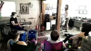 In a basement on a hill. Sisters!