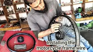 Installing the motorcycle frame wire استعدال جنط أمامي موتوسيكل بعد الحادث