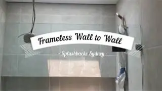 Framless Shower Screen wall to wall with black hardware