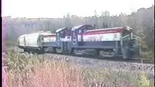 EMD SW9's on the Pittsburg Shawmut, with 2 bay hoppers & Caboose, Gotta luv it. 10/03/1989