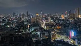 Bangkok city timelapse with vibrant evening traffic and skyline views