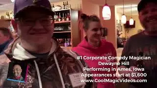 Comedy magician for corporate events for hire , Dewayne Hill, performs for a convention in Ames, IA