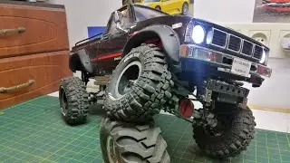 Hg p407 tamiya clone bruiser Toyota hilux небольшой обзор, что я в ней сделал.