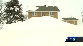 Rural Iowans digging out of massive mountains of snow