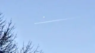 UFO Filmed Tailing Jet Near US Airforce Base