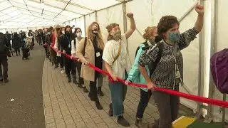 Hundreds protest outside 'failed' COP26 venue | AFP