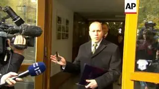 Slovenian President Danilo Turk casts his ballot in presidential election