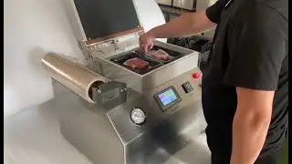 Semi-Automatic Tabletop Vacuum Skin Packaging Machine Packing Food in Tray