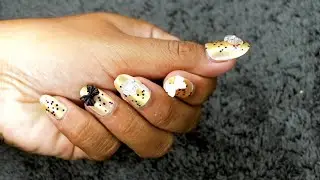 Twilight Gleam: Gold Nails with Purple Glitter #nails #nailtutorial #aquanails #nailart